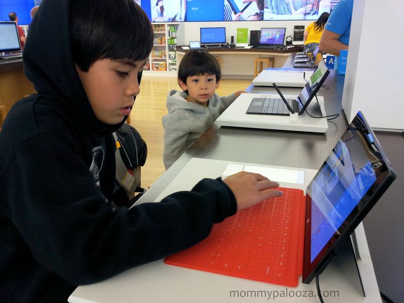 My oldest son trying out the new Surface tablets. #GoMicrosoft