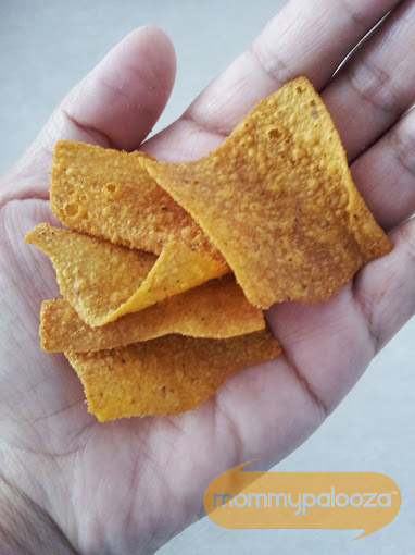 A handful of the Sweet Potato Barbecue Veggie Chips