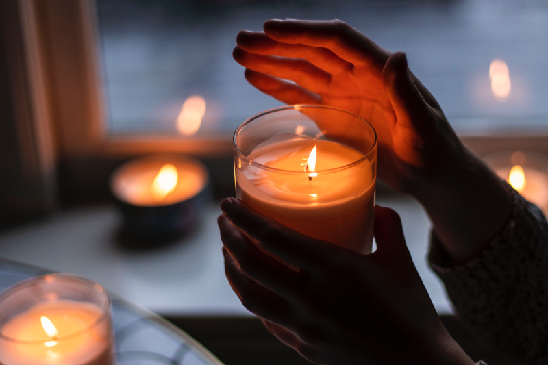 Photo-of-person-holding-scented-candle-3066868