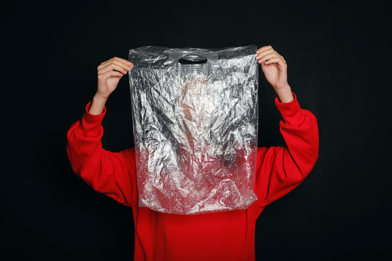 Person-holding-a-plastic-bag-3645507